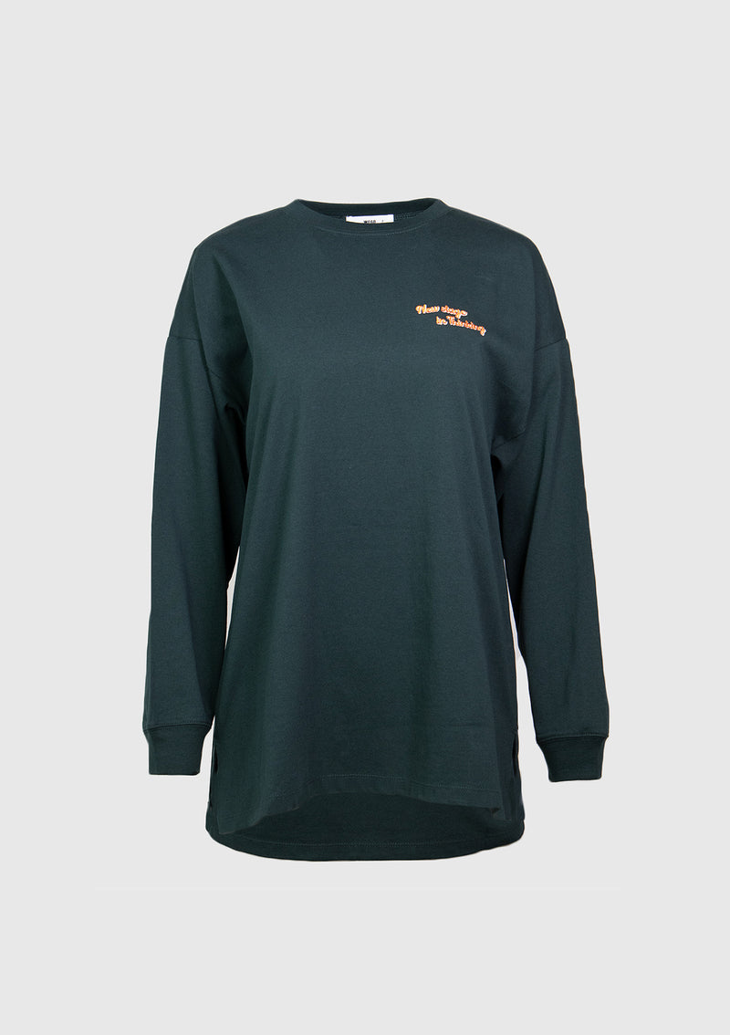NEW STAGE IN THINKING Long-Sleeved Graphic Logo Tee in Dark Green