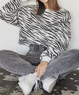 COQUETTERIE Logo Print Long-Sleeved Cropped Tee in Zebra Print