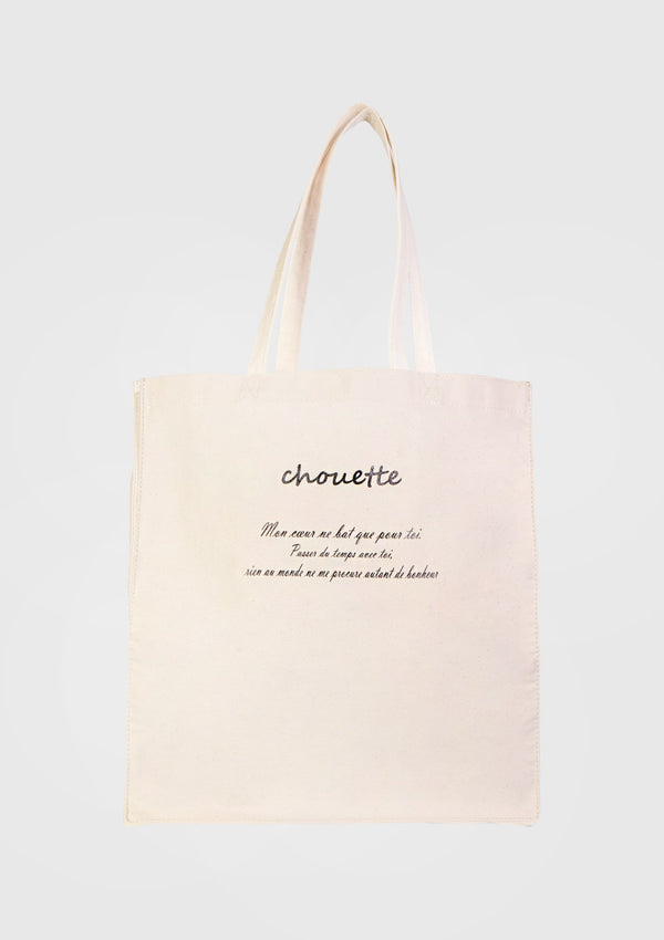 CHOUETTE Slogan Print Boxy Canvas Tote Bag in Off White