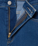 High-Waisted Distressed Skinny Jeans in Denim Medium Wash